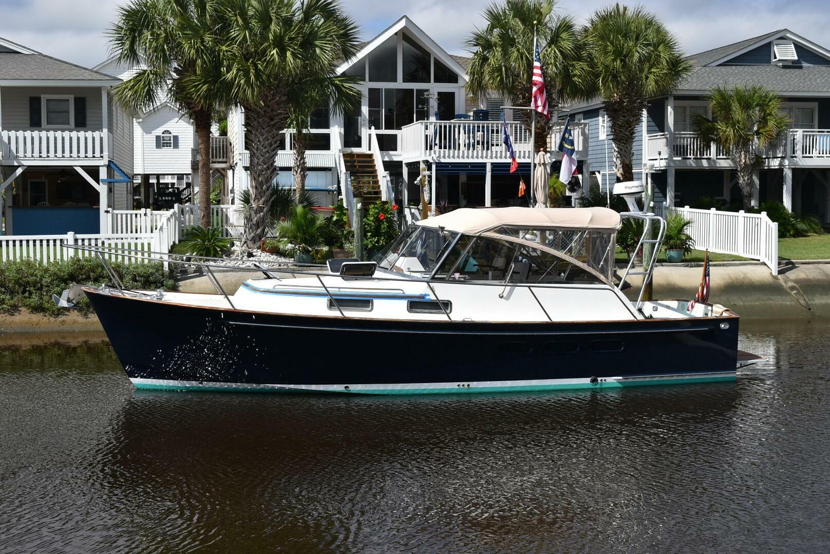 1999 Legacy 34 Express - Image 1