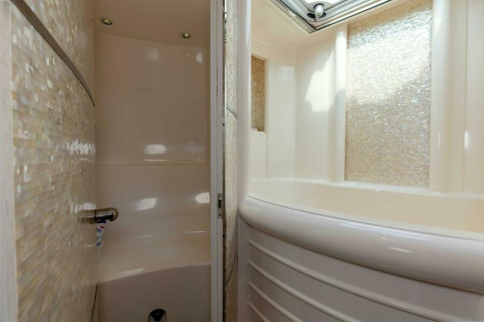 2004 Ebony Custom Sportfish 65 Convertible - Image 27